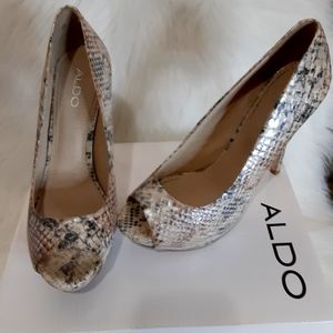 Snakeskin pumps